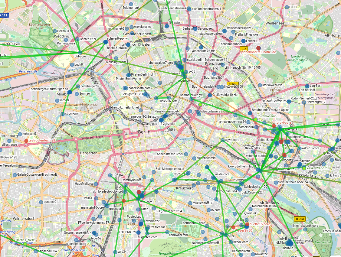 Es ist eine Karte von Berlin zu sehen. Auf der Karte sind viele kleine Punkte. Die meisten sind blau, einige sind rot. Zwischen manchen der Punkte sind grüne Linien gezogen.
